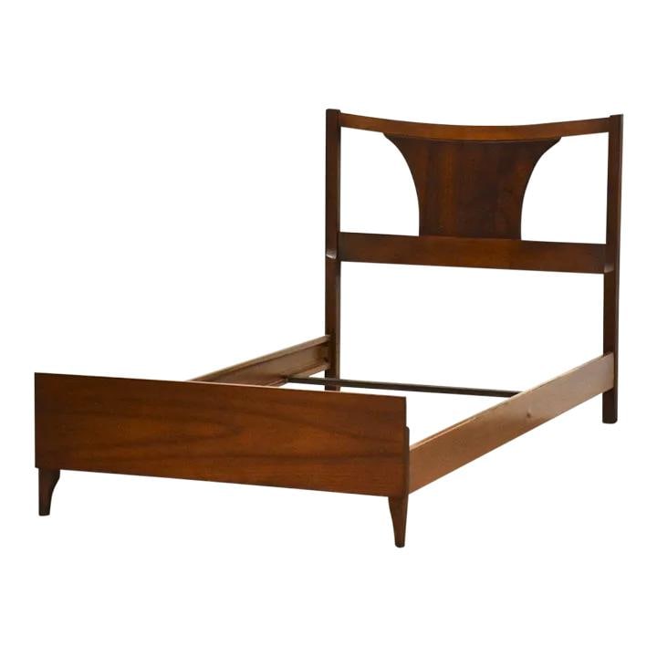 1960s Walnut Mid Century Modern Twin Bed with 5 Inch Clearance: 1960s Walnut Mid Century Modern Twin Bed with 5 Inch Clearance This elegant mid-century modern twin bed is crafted from walnut and showcases a beautiful brown finish. Designed for style and comfort, i
