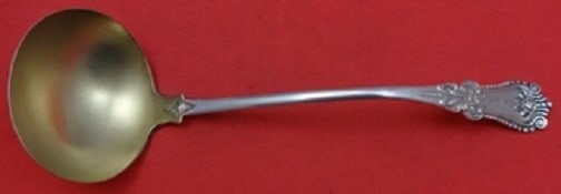 Fessenden Alice Sterling Silver Goldwashed Oyster Ladle 9 3/4": Fessenden Alice Sterling Silver Goldwashed Oyster Ladle 9 3/4" This exquisite 9 3/4" oyster ladle is crafted from sterling silver and features a stunning goldwashed finish. Designed in the elegant Ali