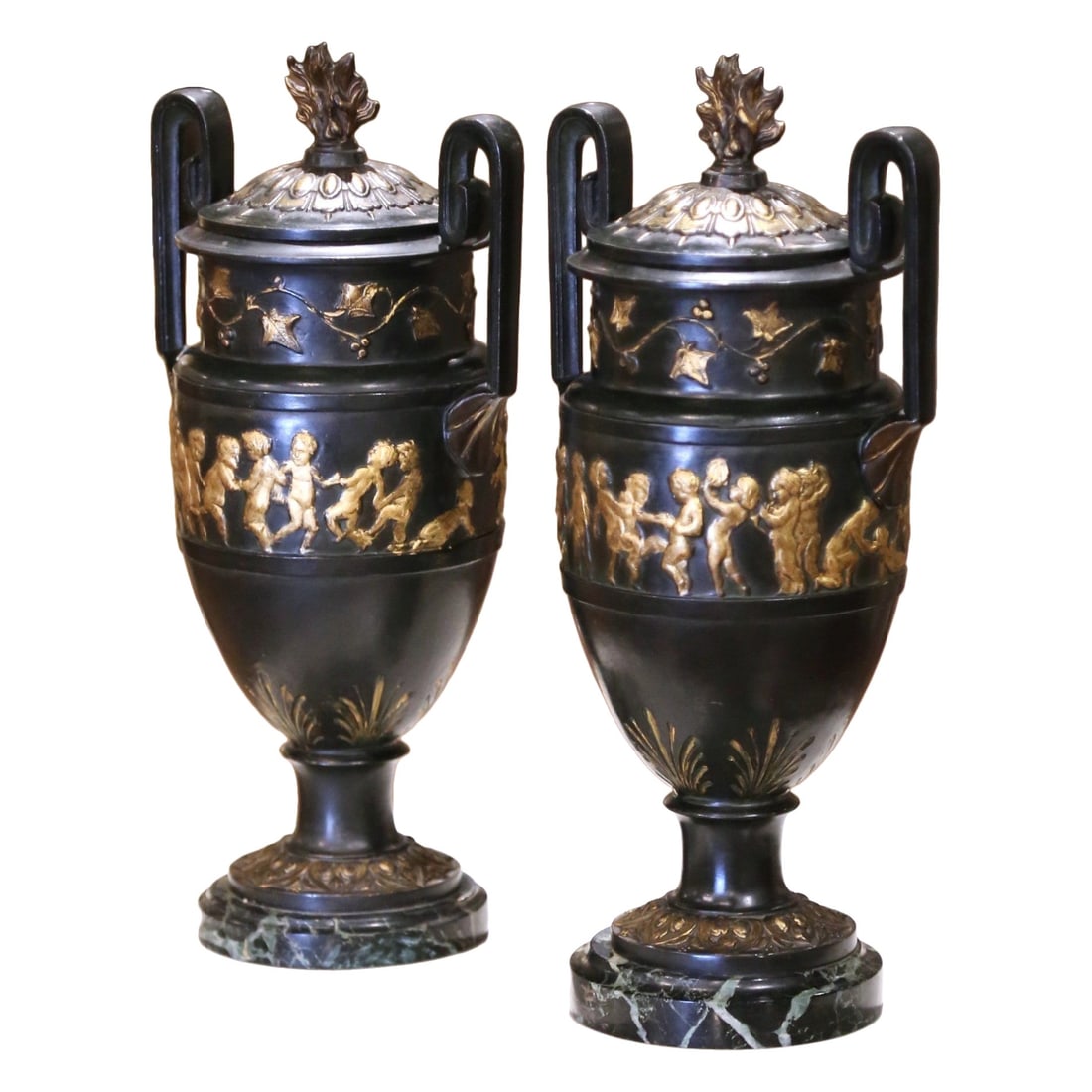 19th Century French Neoclassical Cast Iron Urns on Marble Bases Set of 2: 19th Century French Neoclassical Cast Iron Urns on Marble Bases Set of 2 Enhance your decor with this exquisite pair of 19th-century French Neoclassical cassolettes, expertly crafted in France around 