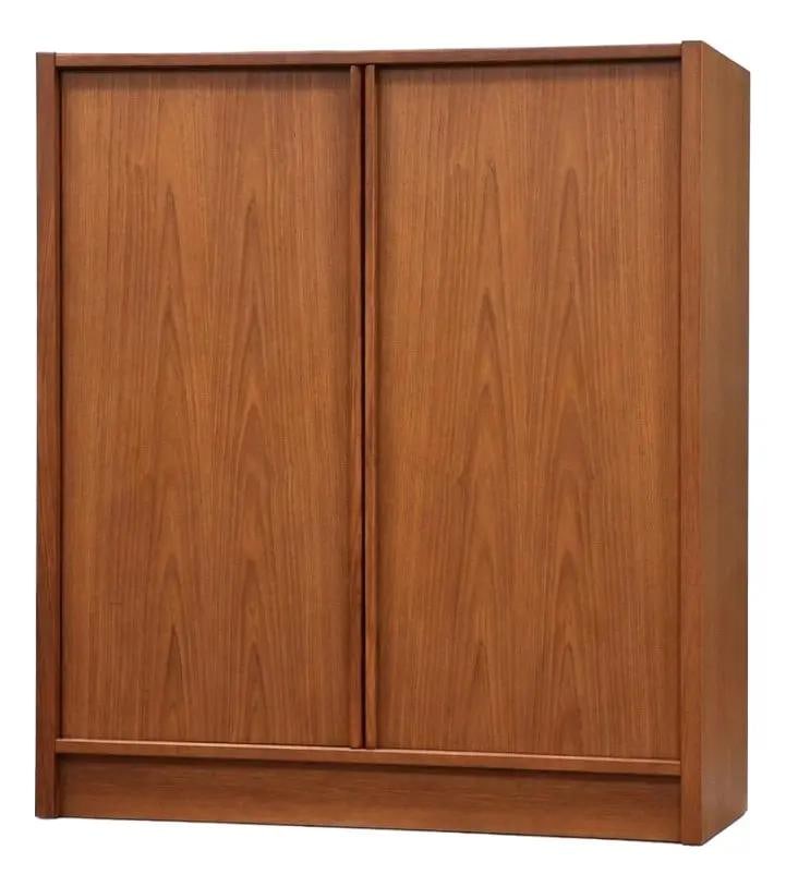 Mid Century Teak Armoire Dresser Made in Denmark Circa 1970s: Mid Century Teak Armoire Dresser Made in Denmark Circa 1970s This mid-century modern armoire dresser features a classic Danish design from the 1970s, crafted from teak wood in a brown finish. It offer
