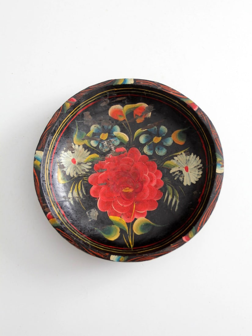 Sioux Trading Post floral painted wooden bowl 9.5 inch: Sioux Trading Post floral painted wooden bowl 9.5 inch This vintage hand-painted wooden bowl features a striking floral motif in red, white, blue, and green set against a black background. The bowl re