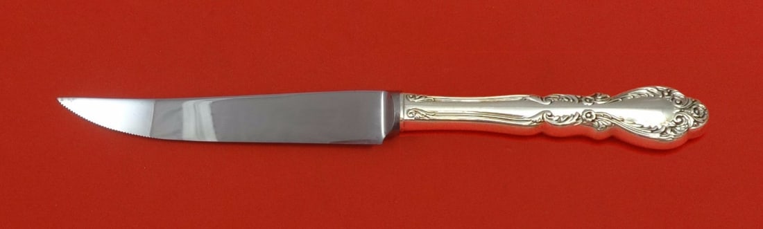 International Sterling Silver Old Charleston Steak Knife 8.5" Serrated: International Sterling Silver Old Charleston Steak Knife 8.5" Serrated This exquisite knife features the Old Charleston pattern by International Sterling, showcasing a sterling silver hollow handle pa