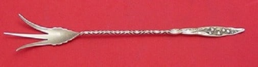 Whiting Sterling Silver 9 1/8" Twisted Lettuce Fork Lily of the Valley: Whiting Sterling Silver 9 1/8" Twisted Lettuce Fork Lily of the Valley This exquisite serving fork features the "Lily of the Valley" pattern by Whiting, crafted from sterling silver. Measuring 9 1/8 i