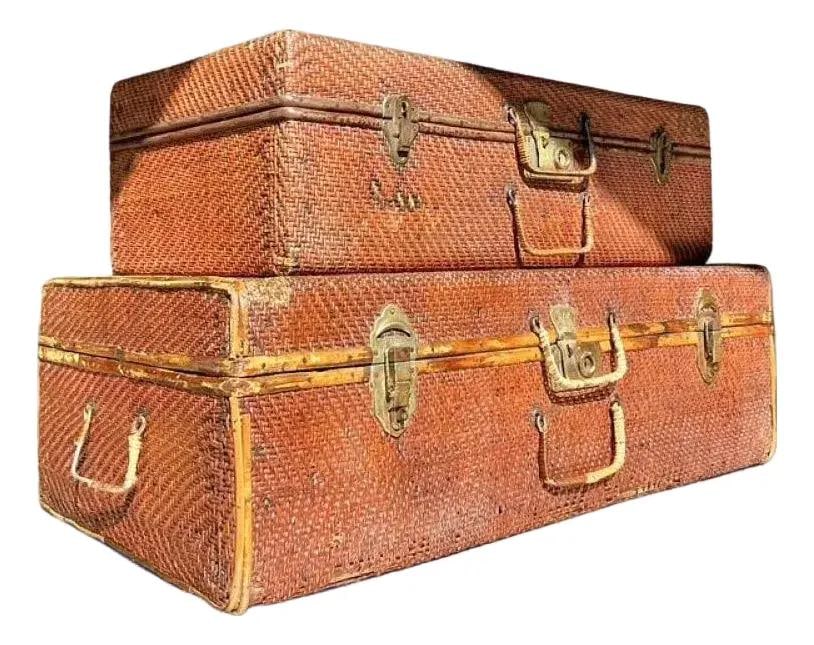 Vintage Bamboo and Woven Rattan Travel Trunks Pair: Vintage Bamboo and Woven Rattan Travel Trunks Pair This Vintage Pair of Bamboo and Woven Rattan Travel Trunks combines functionality with aesthetic appeal, showcasing natural materials and expert craf