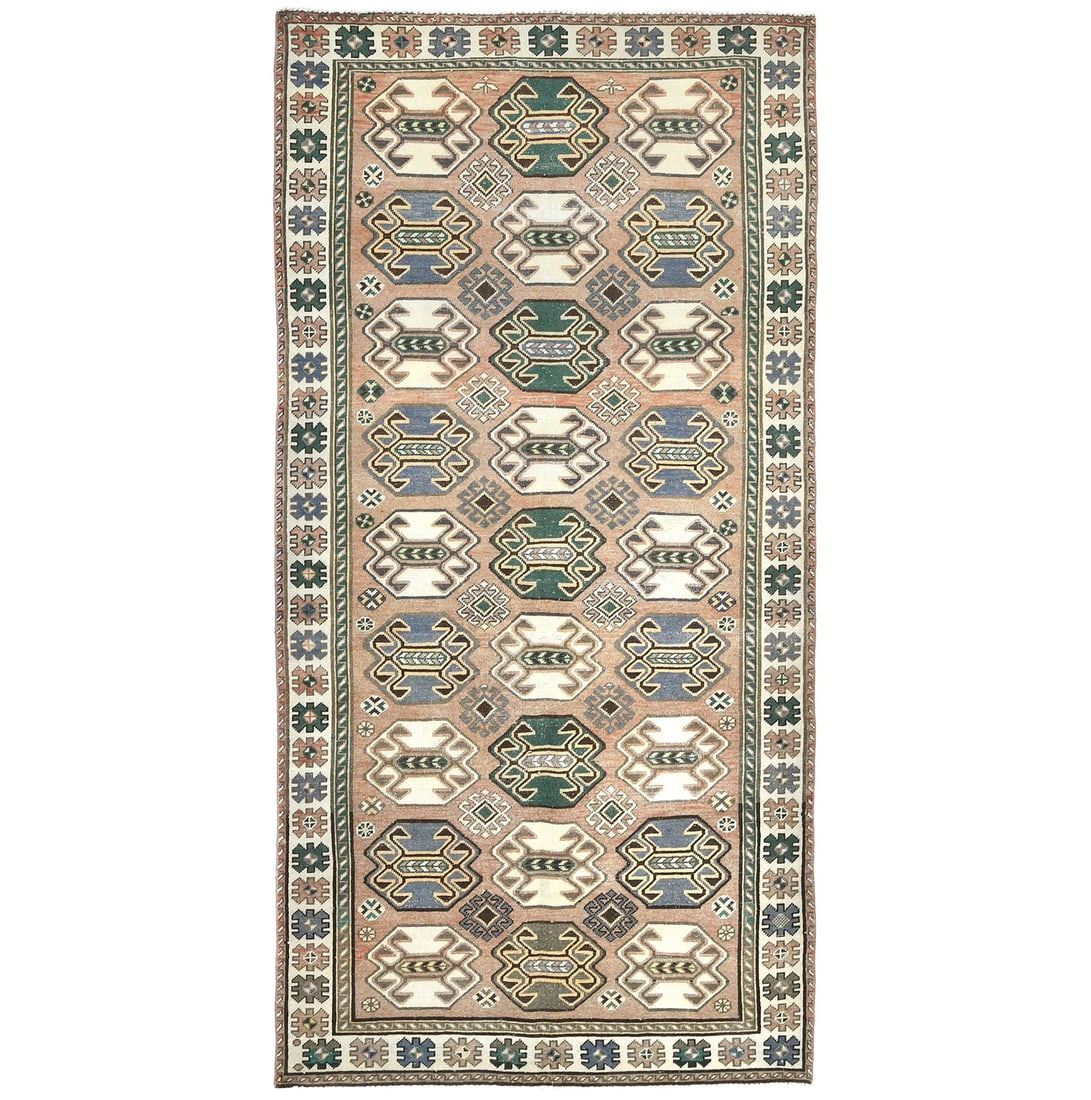 Vintage Semi-Antique Hand-Knotted Oriental Rug 4'7 x 9'5 Geometric Design: Vintage Semi-Antique Hand-Knotted Oriental Rug 4'7 x 9'5 Geometric Design This semi-antique distressed Oriental rug features a muted geometric design that adds a touch of vintage charm to any space. M