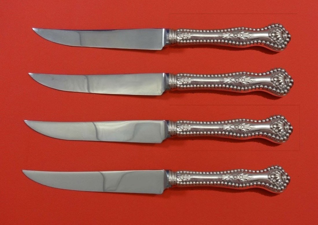 Dominick & Haff Charles II Sterling Silver Steak Knife Set 4pc: Dominick & Haff Charles II Sterling Silver Steak Knife Set 4pc This exquisite 4-piece steak knife set features the distinguished Charles II pattern by Dominick & Haff. Expertly crafted with sterling s