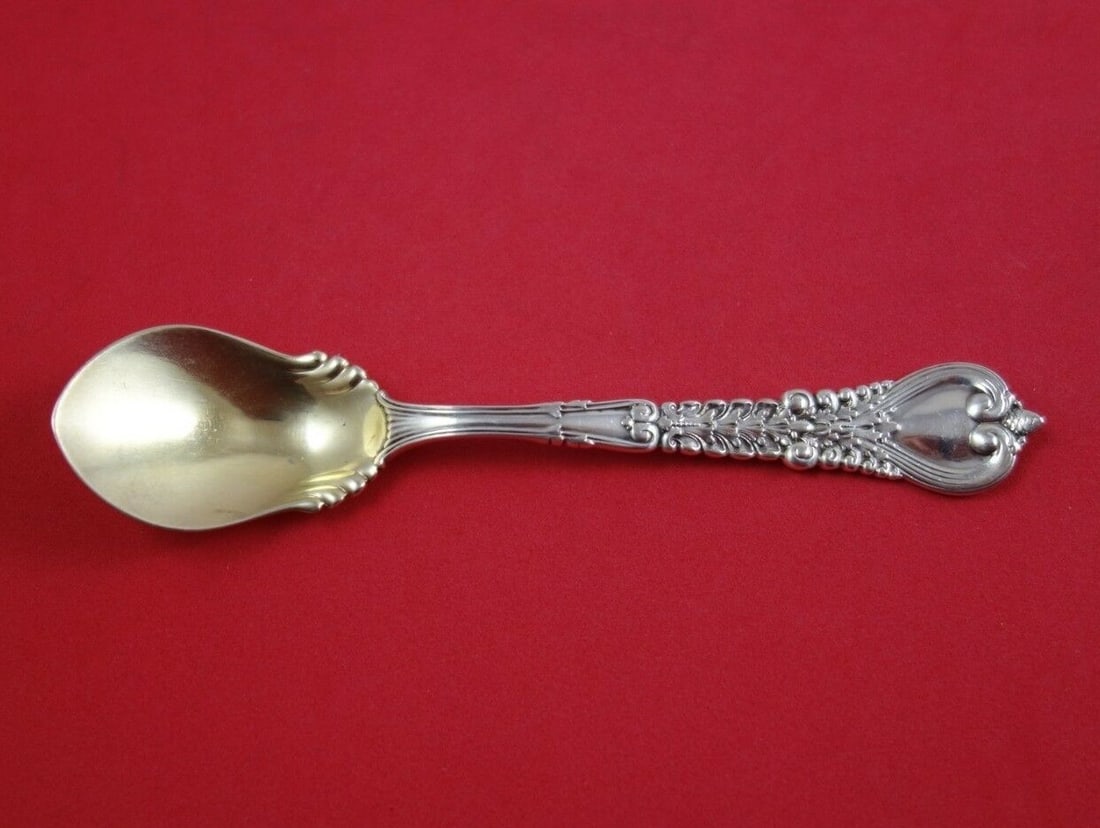 Tiffany & Co Florentine Sterling Silver Ice Cream Spoon Gold Washed Ruffled 6": Tiffany & Co Florentine Sterling Silver Ice Cream Spoon Gold Washed Ruffled 6" Indulge in a touch of elegance with this Florentine ice cream spoon by Tiffany & Co. Crafted from high-quality sterling s