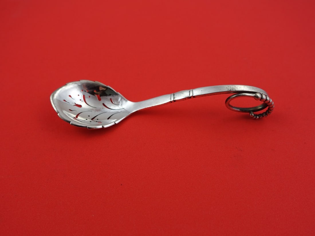 Georg Jensen Ornamental #41 Sterling Silver Sugar Sifter Ladle 5.5 Inches: Georg Jensen Ornamental #41 Sterling Silver Sugar Sifter Ladle 5.5 Inches This exquisite sugar sifter ladle from Georg Jensen's Ornamental #41 pattern is crafted from high-quality sterling silver. Fea