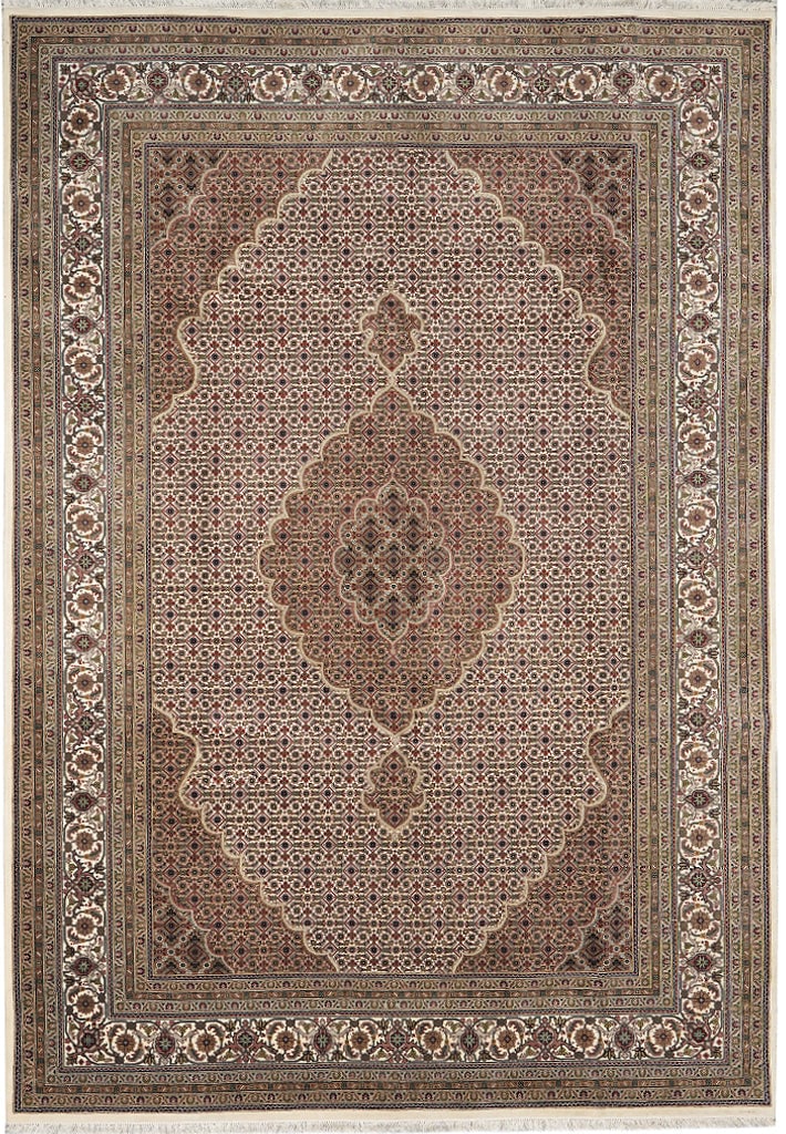 6.8 x 10 Handmade India Mahi Tabriz Wool Silk Rug: 6.8 x 10 Handmade India Mahi Tabriz Wool Silk Rug Free continental US Shipping This handmade India Mahi Tabriz rug features a classic Persian-inspired design with repeating floral medallions and delic