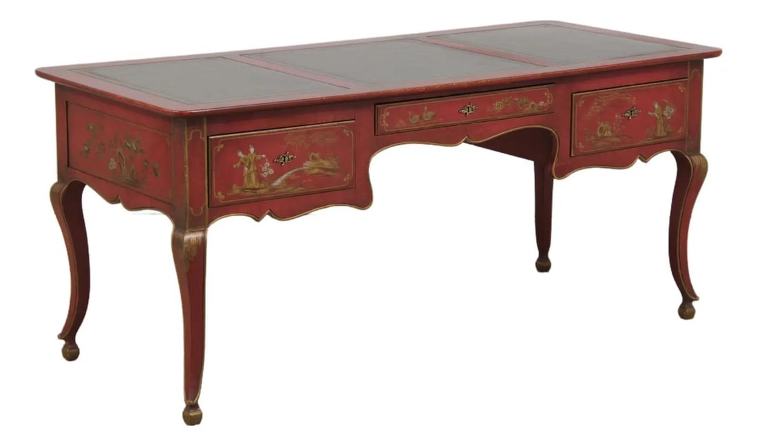 Baker red lacquer bureau plat with leather top and 3 drawers: Baker red lacquer bureau plat with leather top and 3 drawers This Baker 3-drawer desk features a French Regency-inspired design with hand-painted red lacquer and gold-embossed leather top. The drawers