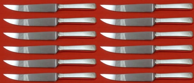 Towle Craftsman Sterling Silver Steak Knife Set of 12: Towle Craftsman Sterling Silver Steak Knife Set of 12 This exquisite set of 12 steak knives, each measuring 8 1/2 inches, showcases the timeless Craftsman pattern by Towle. Crafted from sterling silve