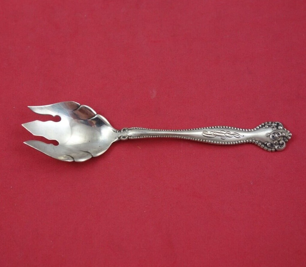 Raleigh Pattern Sterling Silver Ice Cream Fork by Alvin 5 1/8": Raleigh Pattern Sterling Silver Ice Cream Fork by Alvin 5 1/8" Indulge in a touch of elegance with this Raleigh by Alvin Sterling Silver Ice Cream Fork, measuring 5 1/8". Crafted from high-quality ste