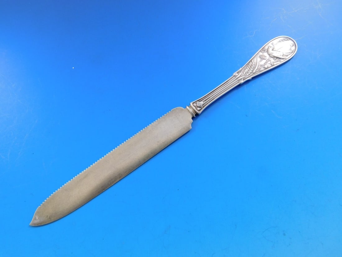 Tiffany & Co Japanese Sterling Silver Citrus Knife 7 3/4" Serrated Blade: Tiffany & Co Japanese Sterling Silver Citrus Knife 7 3/4" Serrated Blade This exquisite citrus knife, crafted by Tiffany & Co., showcases the elegant Japanese pattern and is made entirely of sterling 
