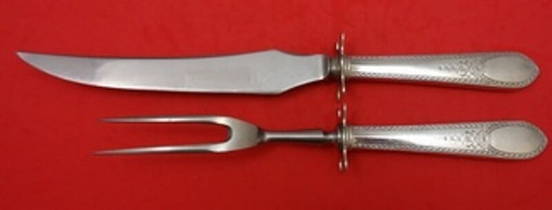 Lunt Early American Engraved Sterling Silver Steak Carving Set 2pc: Lunt Early American Engraved Sterling Silver Steak Carving Set 2pc This exquisite 2-piece steak carving set showcases the Early American Engraved pattern by Lunt, crafted from high-quality sterling si