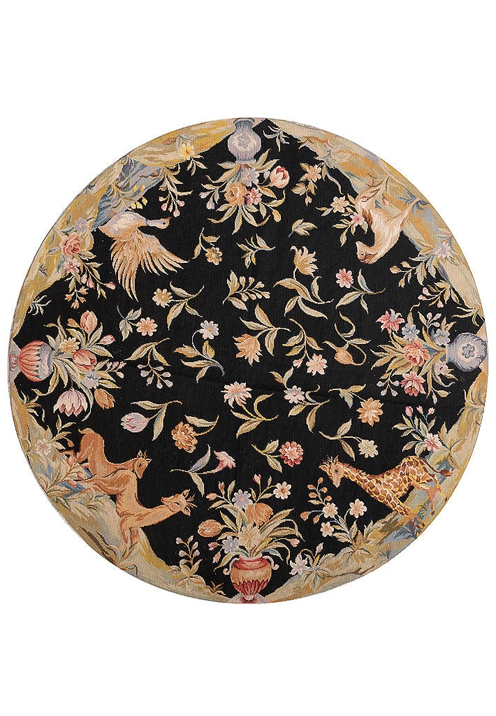 6.0 x 6.0 Round Hand-Knotted Needlepoint Wool Rug Black Friendly Animals: 6.0 x 6.0 Round Hand-Knotted Needlepoint Wool Rug Black Friendly Animals Free continental US Shipping This 6.0 x 6.0 ft round area rug features a handcrafted needlepoint design with playful animal mot