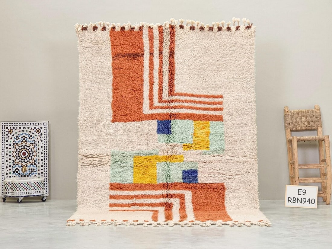 Authentic Handwoven Berber Wool Rug from Morocco 8 x 5 ft: Authentic Handwoven Berber Wool Rug from Morocco 8 x 5 ft Transform your living space with this exquisite handwoven Berber wool rug, a true testament to authentic Moroccan craftsmanship. Skillfully cr