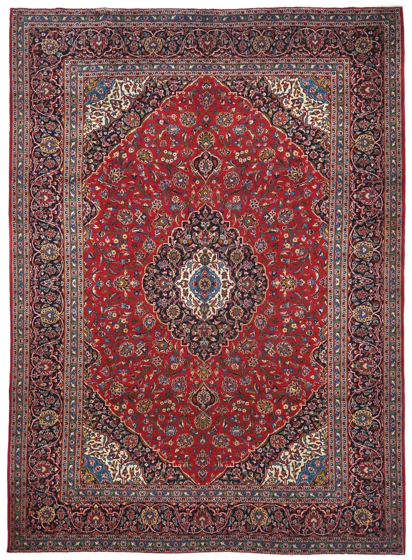 8'1 x 11'3 Wool Floral Red Hand-Knotted Vintage Oriental Rug: 8'1 x 11'3 Wool Floral Red Hand-Knotted Vintage Oriental Rug This vintage hand-knotted Oriental area rug features a striking red floral pattern with accents of purple, navy, cream, blue, pink, caramel