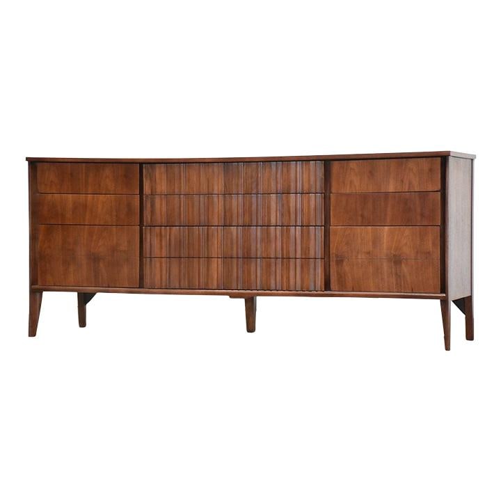 1960s Unagusta Strata Walnut Dresser Mid Century Modern: 1960s Unagusta Strata Walnut Dresser Mid Century Modern Explore this stunning mid-century modern dresser from the 1960s, expertly refinished to restore its original charm. Crafted from rich walnut, th