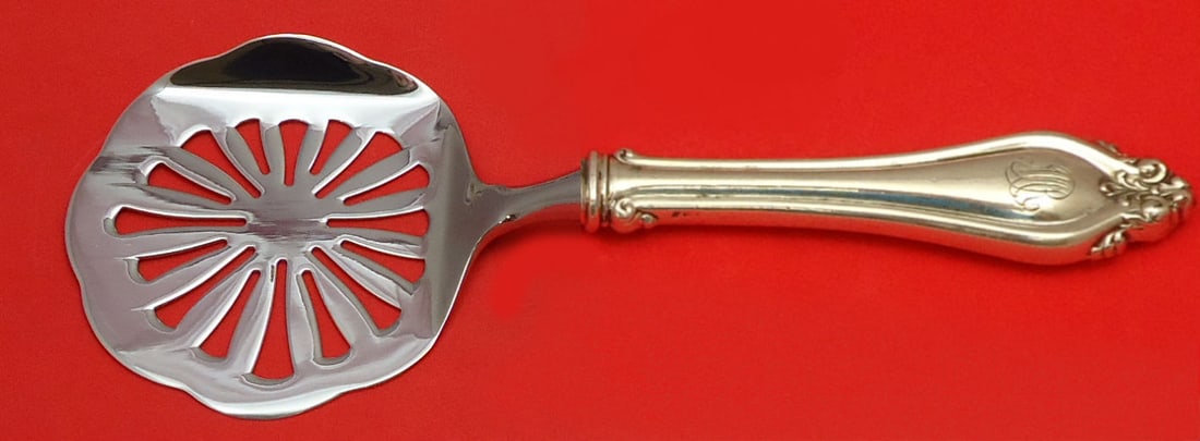 La Perle Tomato Server by Reed and Barton Sterling Silver Custom Made: La Perle Tomato Server by Reed and Barton Sterling Silver Custom Made Enhance your dining experience with the La Perle Tomato Server, expertly crafted by Reed and Barton. This exquisite piece features