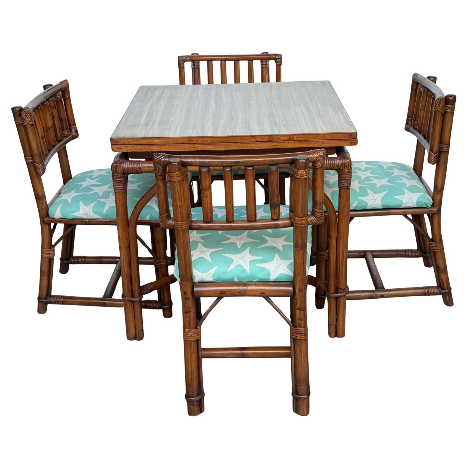 Mid-Century Bamboo Dining Set by Ficks Reed Five Pieces Expandable Table and Chairs: Mid-Century Bamboo Dining Set by Ficks Reed Five Pieces Expandable Table and Chairs This rare and versatile 5-piece Mid-Century Modern set by Ficks Reed features an expandable bamboo and rattan dining