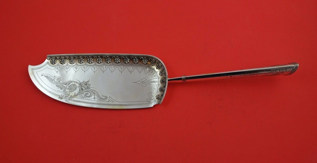 Gorham Sterling Silver Fish Server Number 150 Bright-Cut 12.5": Gorham Sterling Silver Fish Server Number 150 Bright-Cut 12.5" This exquisite fish server, crafted by Gorham, showcases a stunning bright-cut design with a hollow handle. Measuring 12 1/2" in length, 