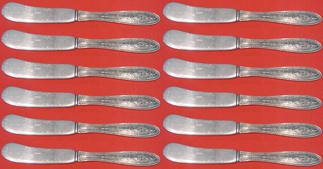 Wedgwood by International Sterling Silver Butter Spreader Set 12 pcs: Wedgwood by International Sterling Silver Butter Spreader Set 12 pcs This exquisite 12-piece set of butter spreaders features a flat handle design, crafted from high-quality sterling silver. The patte