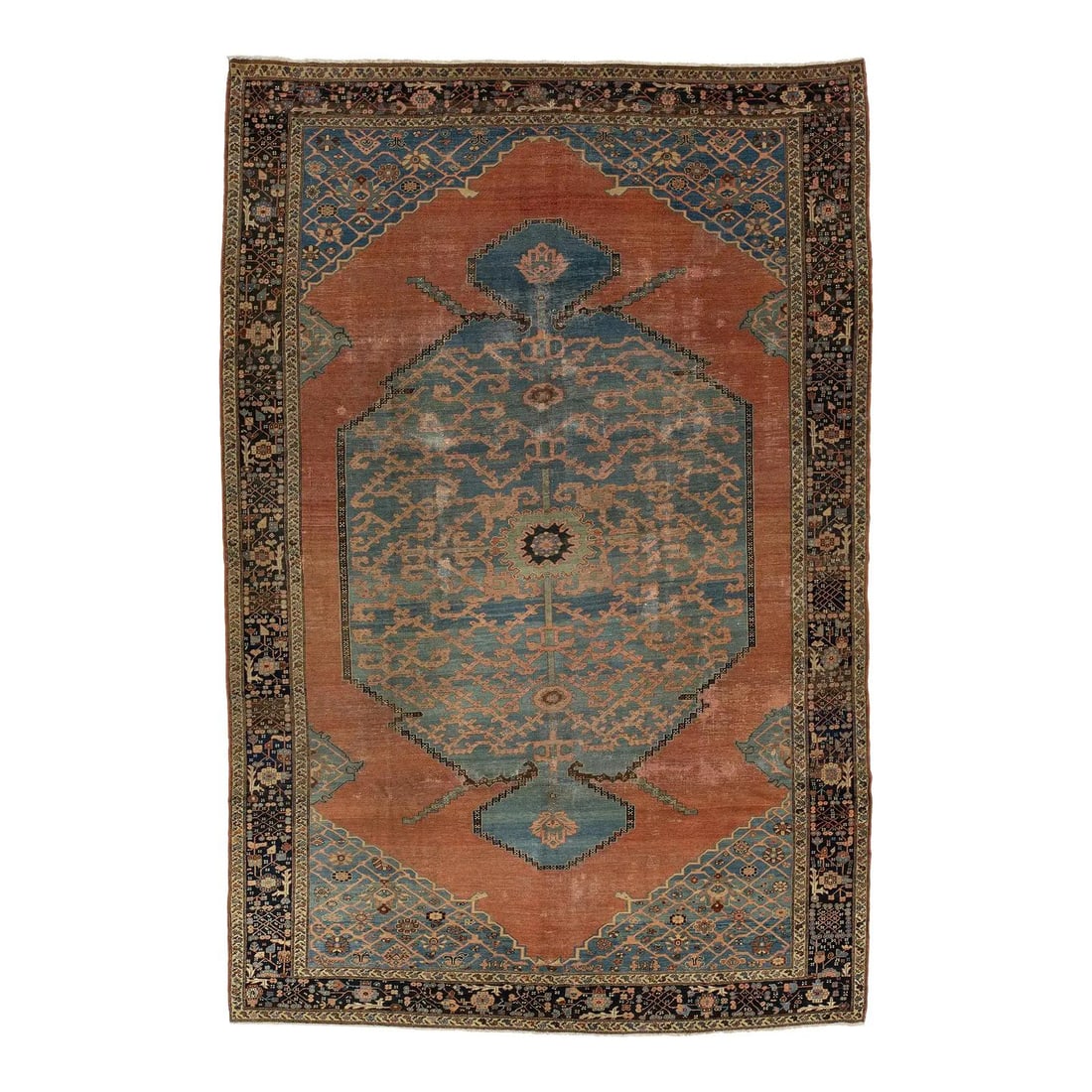 8'5" x 12'8" Antique Heriz Serapi Wool Rug Terracotta Field Medallion: 8'5" x 12'8" Antique Heriz Serapi Wool Rug Terracotta Field Medallion Late 19th-century antique Serapi rug with a commanding oversized geometric medallion, expressive angular Herati motifs, stylized c