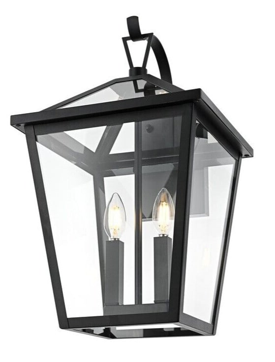 Frankford black iron wall sconce with clear glass 20 inch: Frankford black iron wall sconce with clear glass 20 inch This large outdoor wall sconce features a traditional design with a black iron frame and clear glass panels, offering both durability and styl