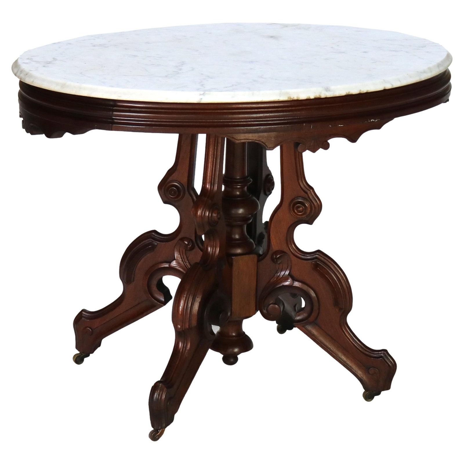 Victorian Revival Carved Walnut Marble Top Table C1880: Victorian Revival Carved Walnut Marble Top Table C1880 This exquisite Antique Victorian Renaissance Revival Carved Walnut Table, dating back to circa 1880, is a prime example of the intricate craftsma