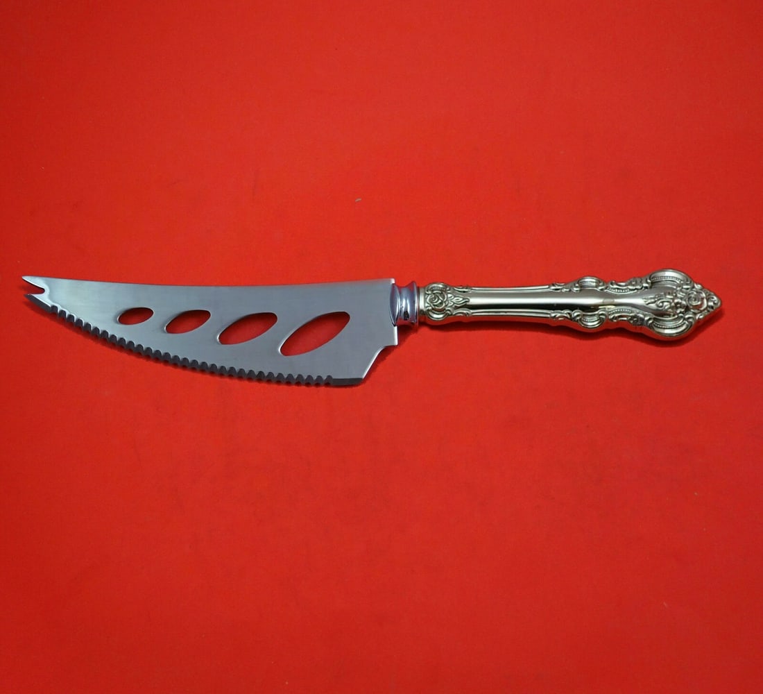 Towle El Grandee Sterling Silver Cheese and Sausage Knife 7" Custom Made: Towle El Grandee Sterling Silver Cheese and Sausage Knife 7" Custom Made Introducing the El Grandee Cheese and Sausage Knife by Towle, a beautifully crafted piece made from sterling silver with a holl