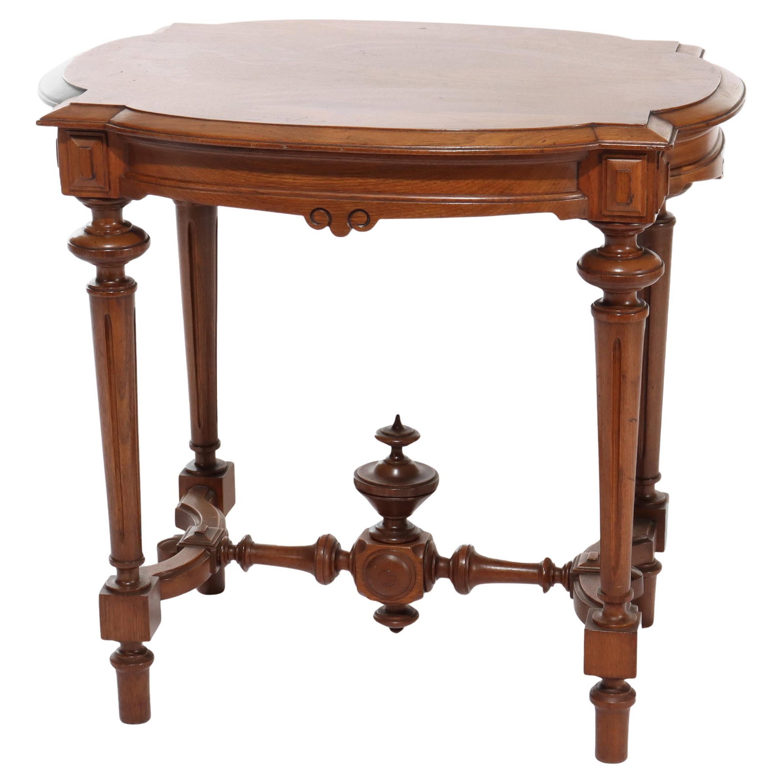 Renaissance Revival Walnut Turtle Top Side Table C1890: Renaissance Revival Walnut Turtle Top Side Table C1890 This antique side table is a remarkable example of Renaissance Revival design, crafted around 1890. It features a unique turtle top shape, elegan