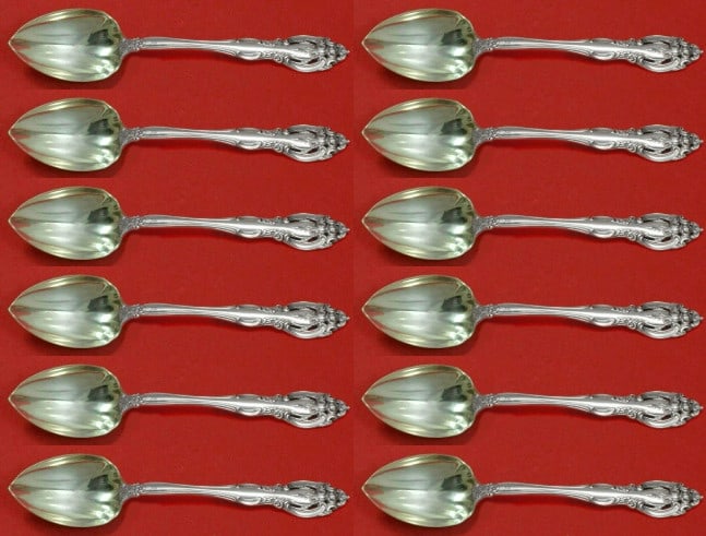 Gorham La Scala Sterling Silver Grapefruit Spoon Set 12 pc 6 1/4 inch: Gorham La Scala Sterling Silver Grapefruit Spoon Set 12 pc 6 1/4 inch Elevate your dining experience with this exquisite 12-piece set of La Scala grapefruit spoons by Gorham. Crafted from premium ster