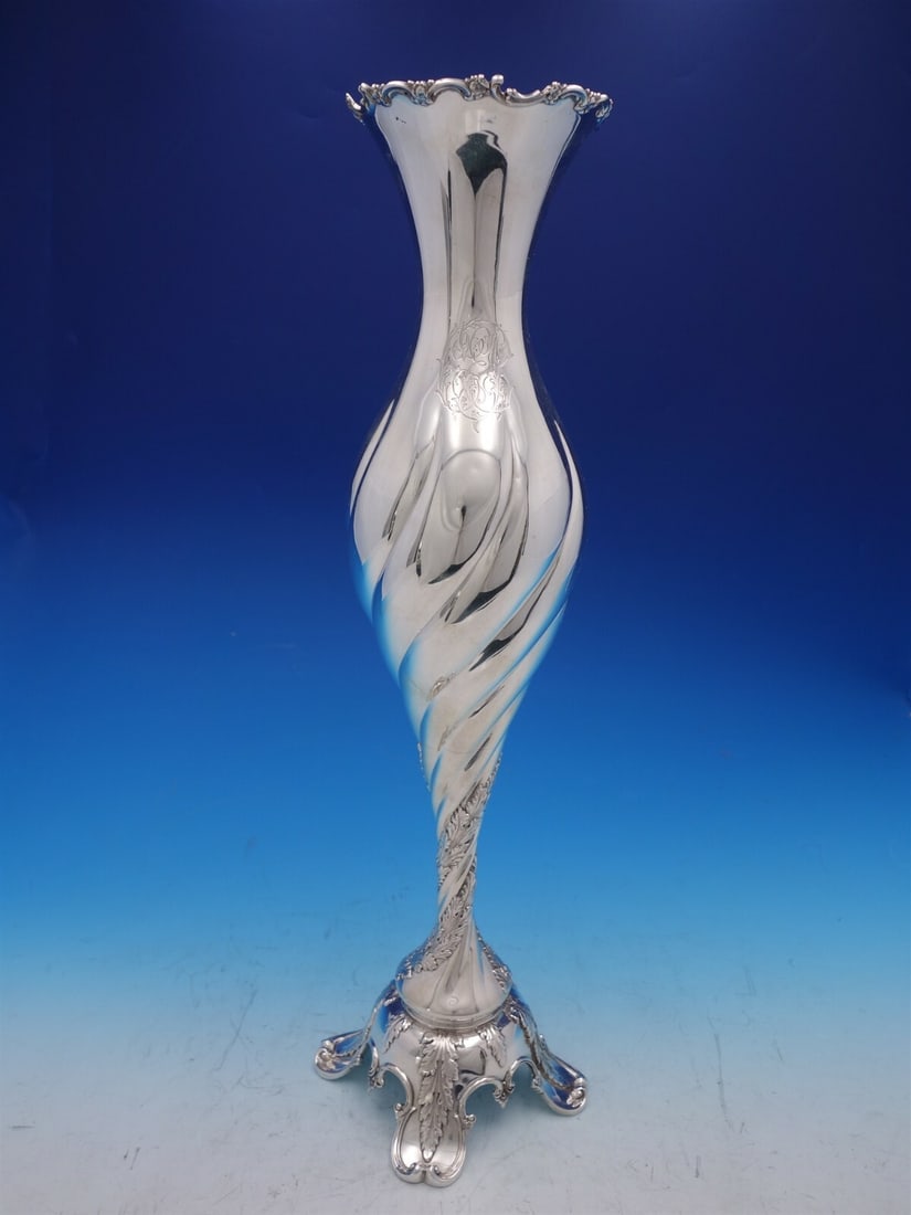Tall Sterling Silver Vase Chrysanthemum Pattern by Tiffany & Co 21 Inch: Tall Sterling Silver Vase Chrysanthemum Pattern by Tiffany & Co 21 Inch This impressive tall vase by Tiffany & Co. features the renowned Chrysanthemum pattern in sterling silver. The vase is beautiful