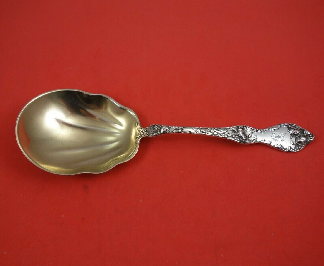 Reed and Barton Les Cinq Fleurs Sterling Silver Berry Spoon 9 1/4 inch: Reed and Barton Les Cinq Fleurs Sterling Silver Berry Spoon 9 1/4 inch This exquisite berry spoon from Reed and Barton features the elegant Les Cinq Fleurs pattern. Crafted from sterling silver and go