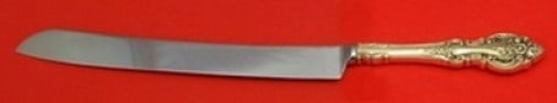 Wallace Grand Victorian Sterling Silver Wedding Cake Knife 12": Wallace Grand Victorian Sterling Silver Wedding Cake Knife 12" This exquisite Wedding Cake Knife from the Grand Victorian pattern by Wallace is a must-have for any special occasion. Crafted from sterl