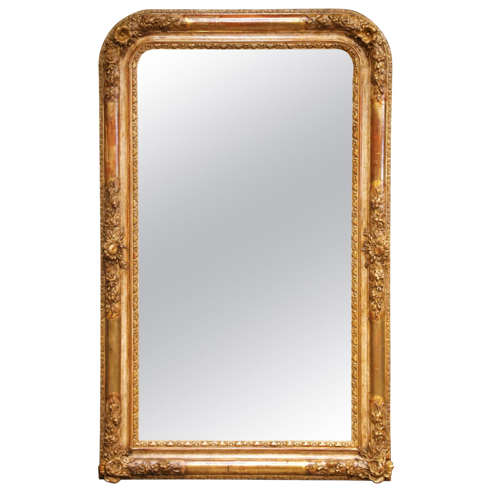 French Louis Philippe Giltwood Mirror with Floral Carved Frame: French Louis Philippe Giltwood Mirror with Floral Carved Frame An antique French Louis Philippe wall mirror from the mid-19th century, circa 1860. It features a rectangular form with rounded upper cor