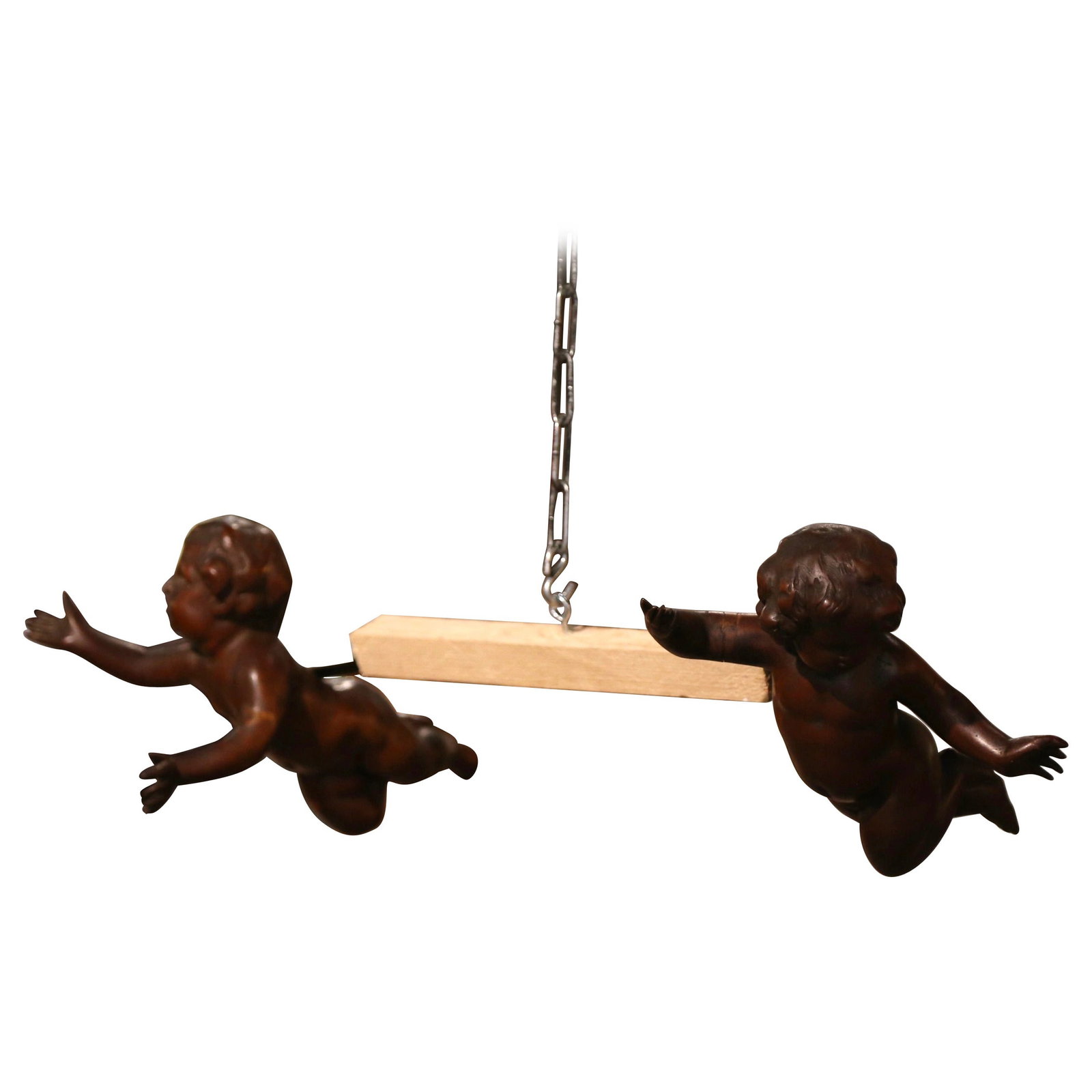 Set of 2 Italian walnut cherub wall sculptures: Set of 2 Italian walnut cherub wall sculptures This pair of late 19th-century Italian wall sculptures features finely hand-carved flying cherubs crafted from solid walnut. Each cherub is depicted in a