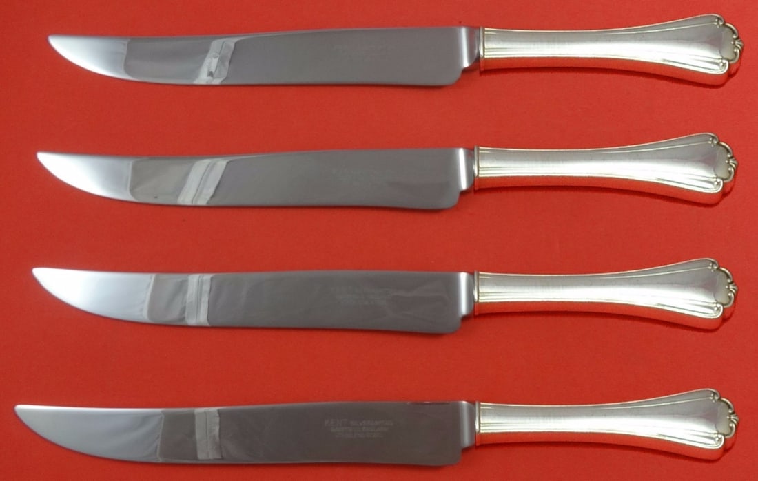 Lunt Delicacy Sterling Silver Texas-Sized Steak Knife Set 4pc: Lunt Delicacy Sterling Silver Texas-Sized Steak Knife Set 4pc This impressive 4-piece steak knife set is crafted from sterling silver with a hollow handle and stainless steel blades, designed in the e