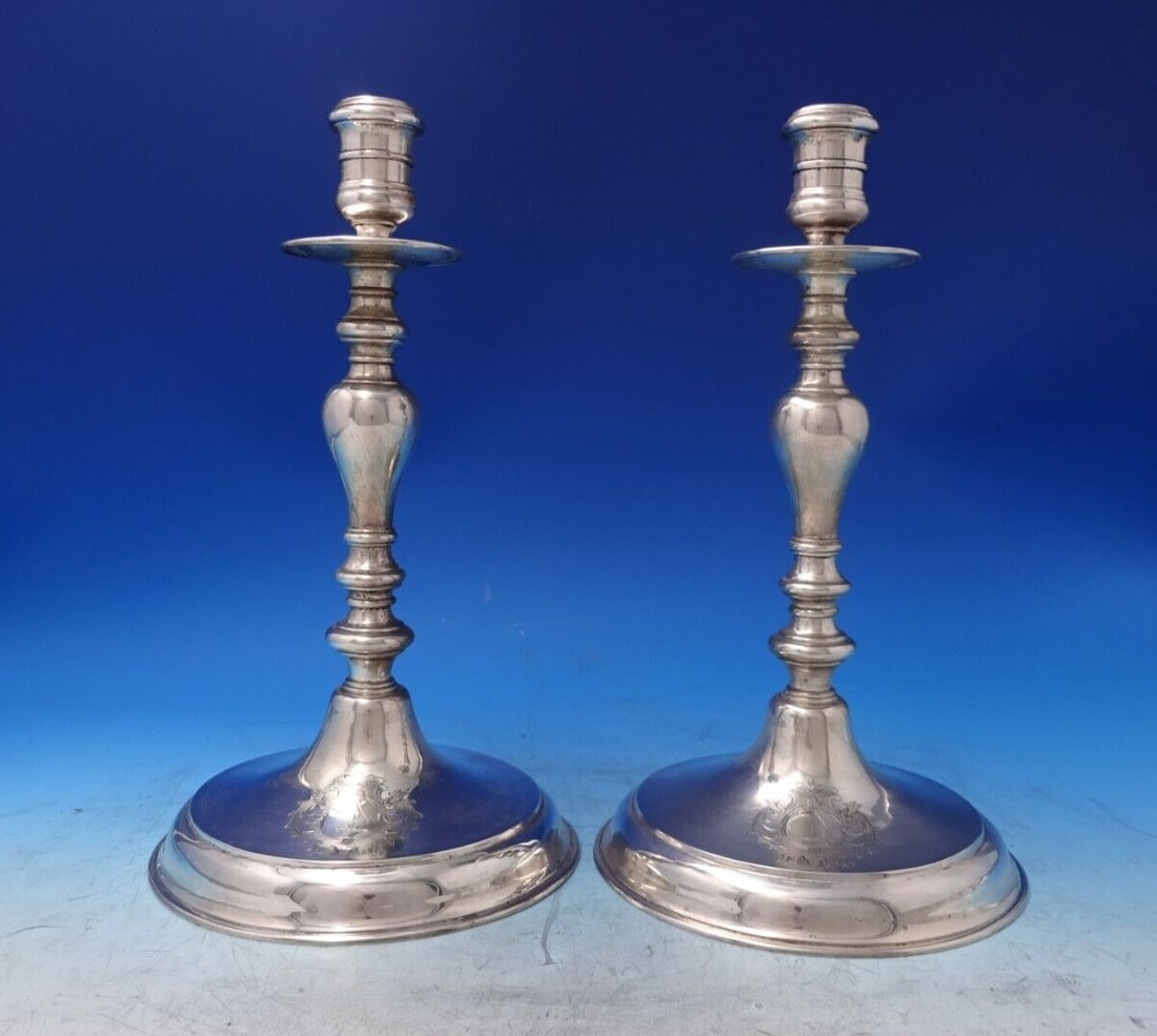 Kalo Handwrought Sterling Silver Candlestick Pair with Family Crest: Kalo Handwrought Sterling Silver Candlestick Pair with Family Crest This exquisite pair of Kalo sterling silver candlesticks is handwrought and features a distinguished family crest on the base. Stand