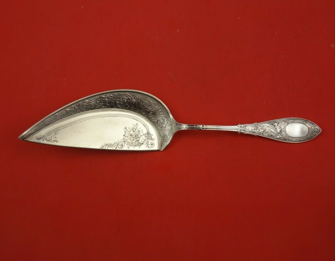 Whiting Sterling Silver Arabesque Crumber Bright-Cut 11 Inch Heirloom: Whiting Sterling Silver Arabesque Crumber Bright-Cut 11 Inch Heirloom This exquisite 11" crumber is crafted from sterling silver and features the elegant Arabesque pattern by Whiting. Dating back to t