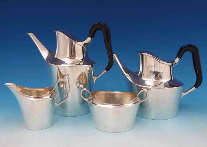 Mid Century Hans Hansen Charlotte Sterling Four Piece Danish Tea Coffee Set: Mid Century Hans Hansen Charlotte Sterling Four Piece Danish Tea Coffee Set This is a Charlotte pattern sterling silver four-piece tea set by Hans Hansen, crafted in Denmark in the post-1940 period. T
