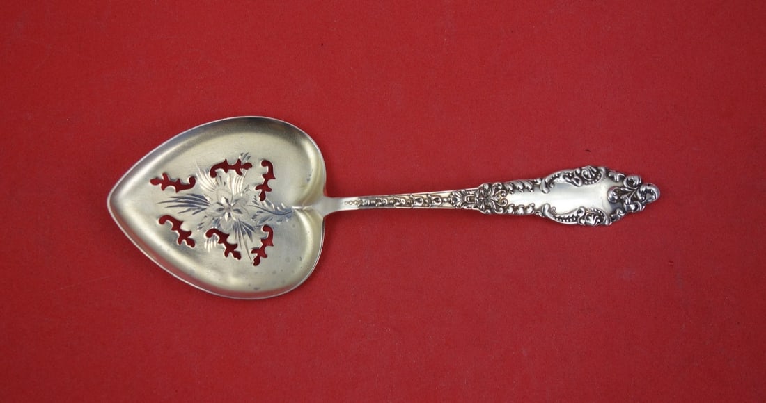 Sterling Silver Lafayette Nut Spoon by Baker-Manchester 5 3 8: Sterling Silver Lafayette Nut Spoon by Baker-Manchester 5 3 8 This is a Baker-Manchester sterling silver nut spoon in the Lafayette pattern, featuring brite-cut floral decoration. Measuring 5 3/8 inch