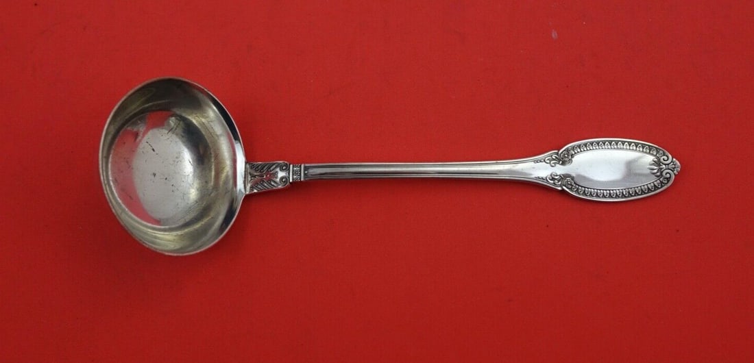 Italian Sterling Empire Pattern Silver Gravy Ladle 7 1/8": Italian Sterling Empire Pattern Silver Gravy Ladle 7 1/8" This exquisite Empire gravy ladle is crafted from high-quality sterling silver, showcasing the elegant design of the Empire pattern by Italian