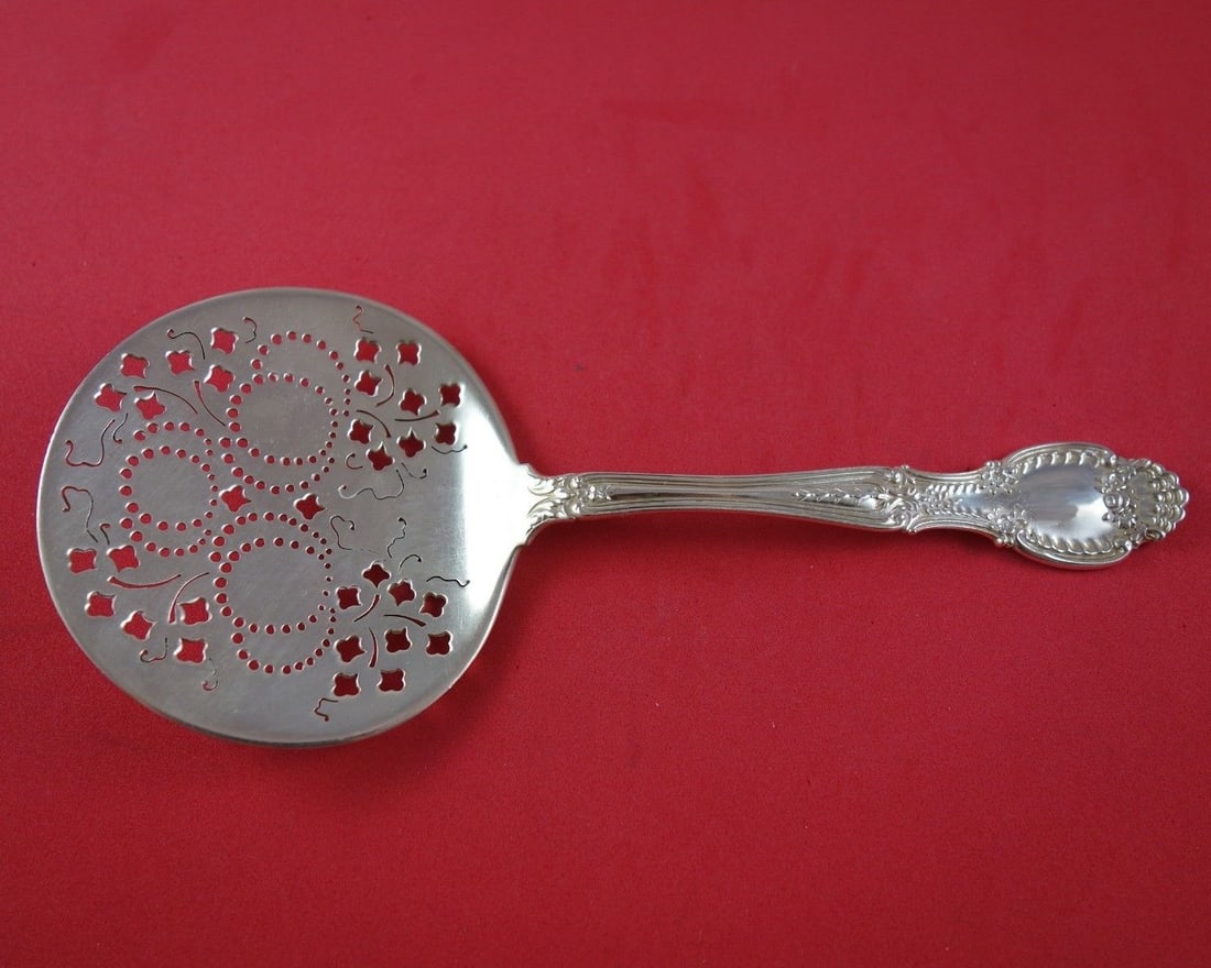 Tiffany & Co. Richelieu Sterling Silver Tomato Server with Scrolly Piercing: Tiffany & Co. Richelieu Sterling Silver Tomato Server with Scrolly Piercing This exquisite Richelieu Tomato Server from Tiffany & Co. showcases remarkable craftsmanship in sterling silver, dating back