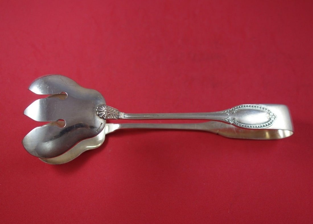 Buccellati Empire Sterling Silver Salad Tong 8.5 Inches: Buccellati Empire Sterling Silver Salad Tong 8.5 Inches This exquisite salad tong is crafted in sterling silver and features the elegant Empire pattern by Buccellati. Measuring 8 1/2 inches, it showca