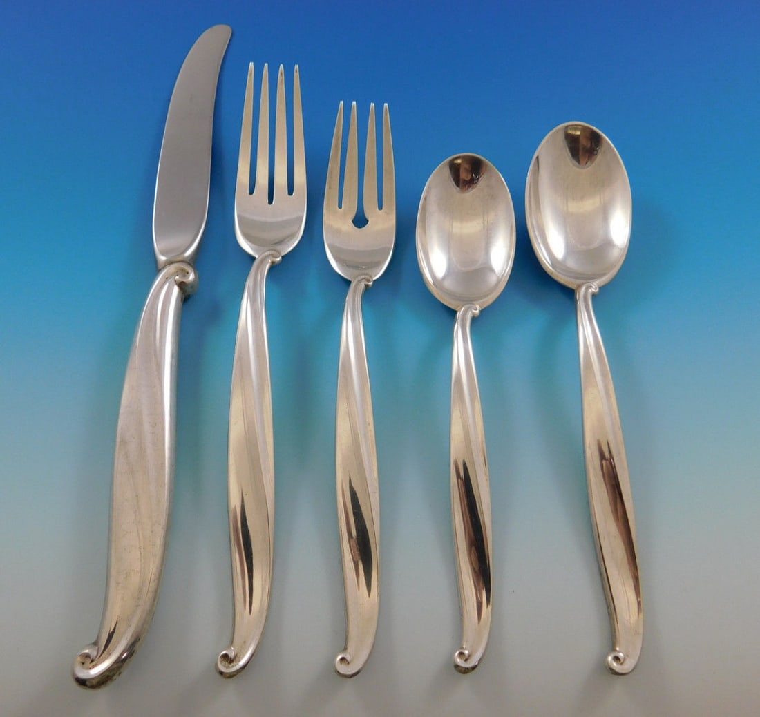 International Sterling Swan Lake 28-Piece Flatware Set with Caddy: International Sterling Swan Lake 28-Piece Flatware Set with Caddy Enhance your dining experience with this exquisite 28-piece Sterling Silver Flatware Set from the Swan Lake pattern by International S