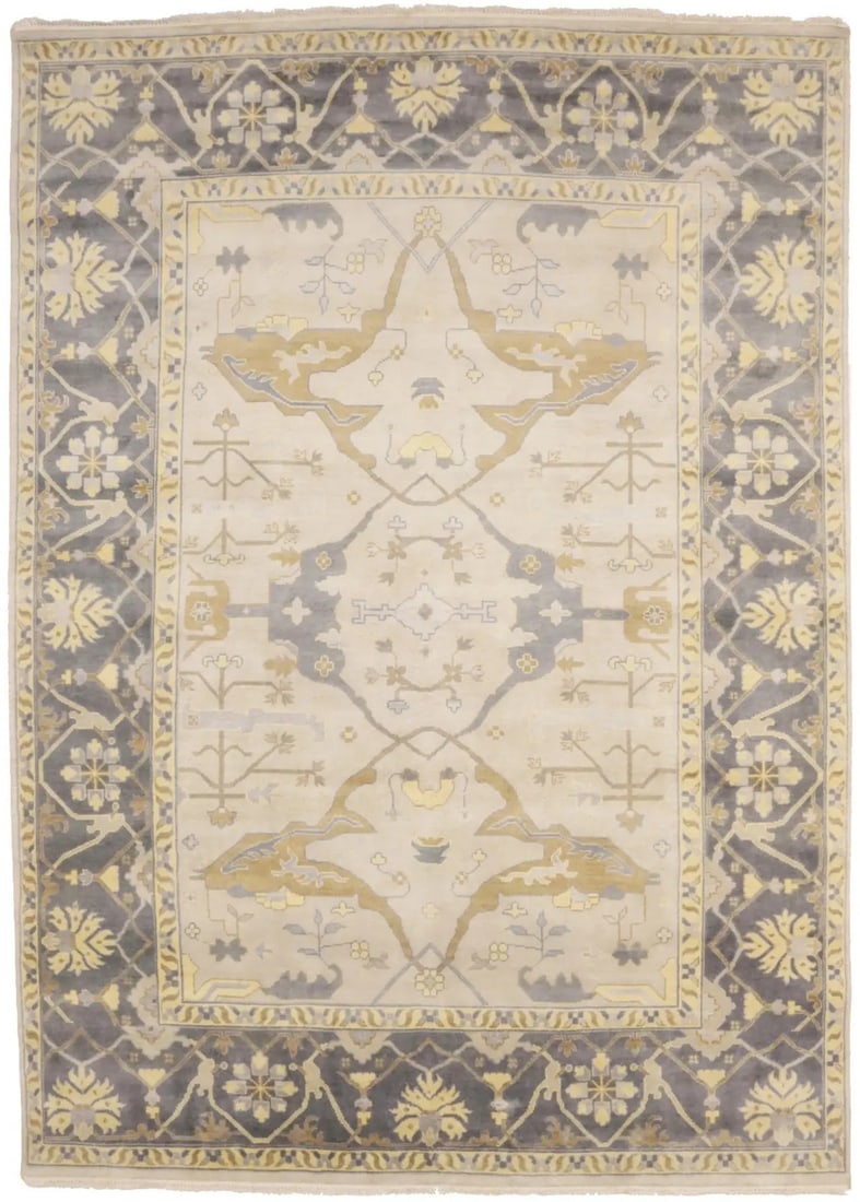 10x14 Wool Oushak Floral Area Rug Hand-Knotted Modern Indian Carpet: 10x14 Wool Oushak Floral Area Rug Hand-Knotted Modern Indian Carpet This hand-knotted area rug features a vintage-style floral Oushak design with muted tones of cream, brownish gray, and beige. Made f
