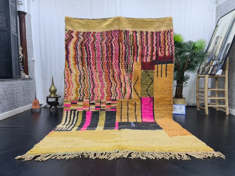 Authentic Colorful Handmade Moroccan Berber Wool Rug 9.84 x 6.56 feet: Authentic Colorful Handmade Moroccan Berber Wool Rug 9.84 x 6.56 feet Experience the warmth and vibrancy of this authentic handmade Moroccan Berber wool area rug. Skillfully woven by local Berber wome