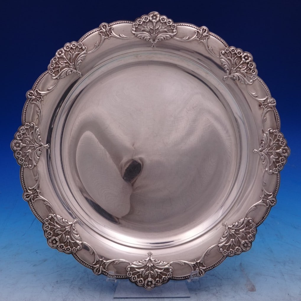 International Queens Lace Sterling Silver Serving Plate 11 5 8: International Queens Lace Sterling Silver Serving Plate 11 5 8 This is a Queens Lace pattern sterling silver serving plate by International. Crafted in the United States and dating to the post-1940 pe