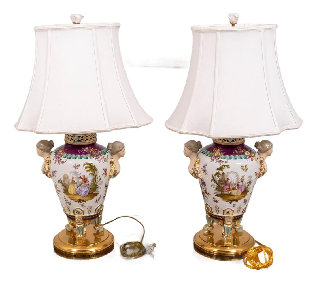 Pair of 1950s Hand Gilt Porcelain Urn Table Lamps with Floral Motif: Pair of 1950s Hand Gilt Porcelain Urn Table Lamps with Floral Motif This vintage pair of urn-shaped porcelain table lamps from the 1950s features hand-gilt floral motifs and hand-painted scenes in the